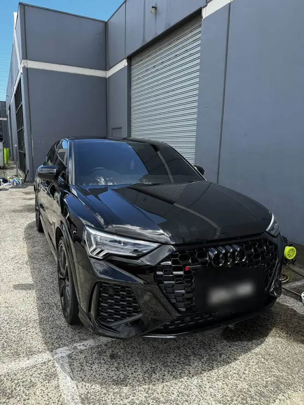 Black Audi RS Q3, front three-quarter view