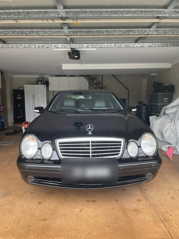 Black Mercedes-Benz CLK in a garage, front view