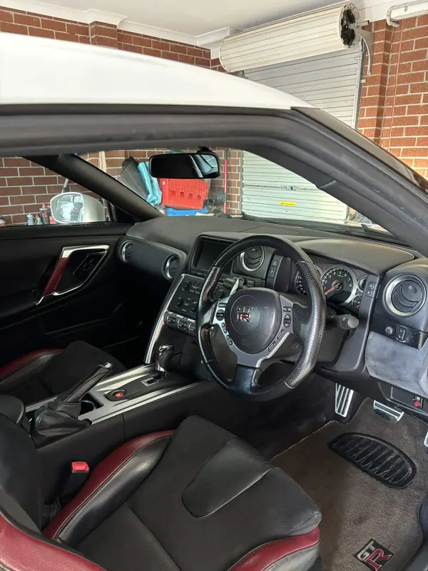 Black and red interior of the GT-R