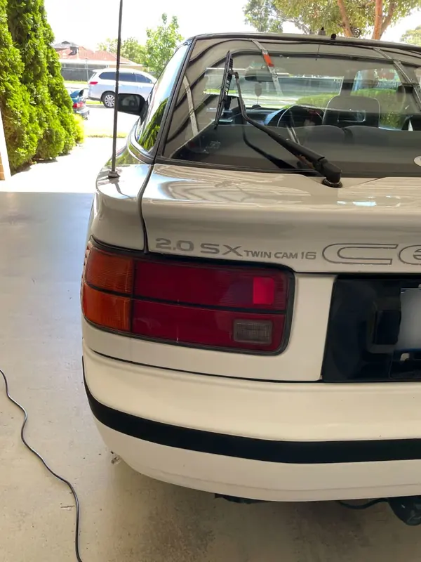Rear of the white Celica 2.0 SX